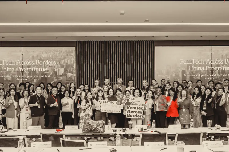 The Shanghai Summit group photo: attendees gathered in front of the stage screen.